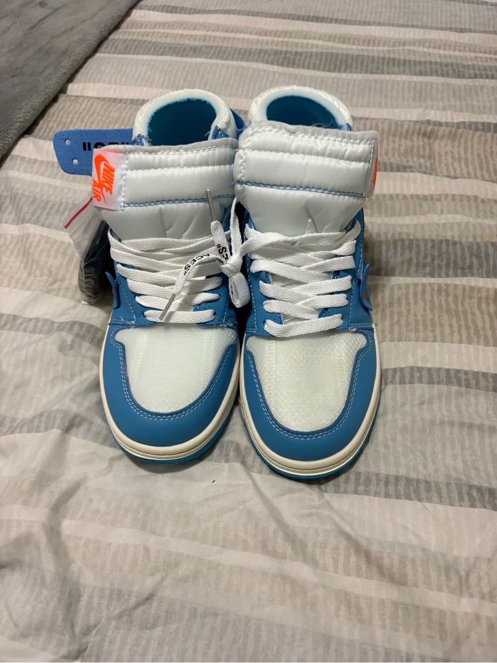 Jordan Men’s High-Top Sneakers in White and Blue with Orange Accents